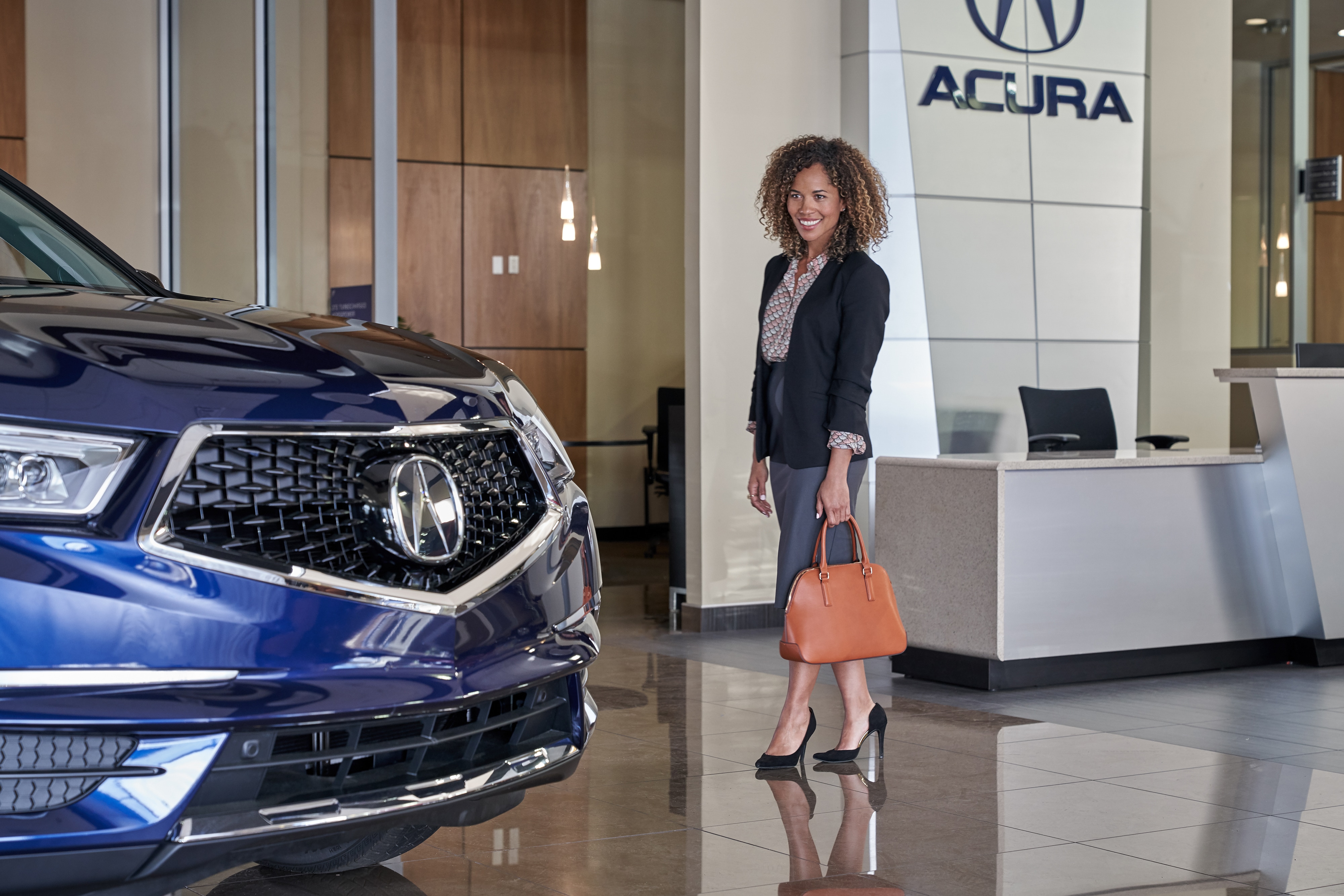Customer checking an Acura